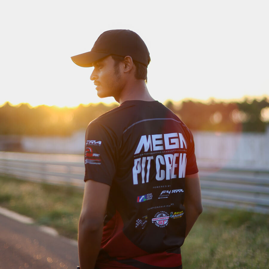 Santhosh Reddy Pilli in MEGA Pit Crew shirt at sunset